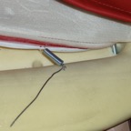 hooking spring with feeder wire to support wire.jpg