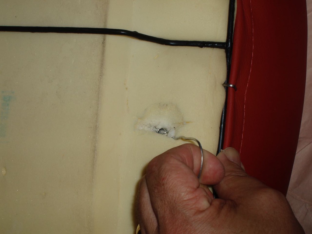 Using wire hook to pull spring out.jpg