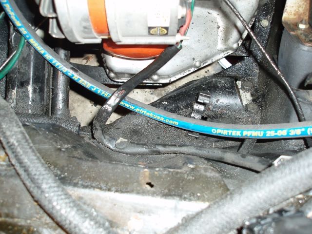 Running down under altenator wires now.jpg